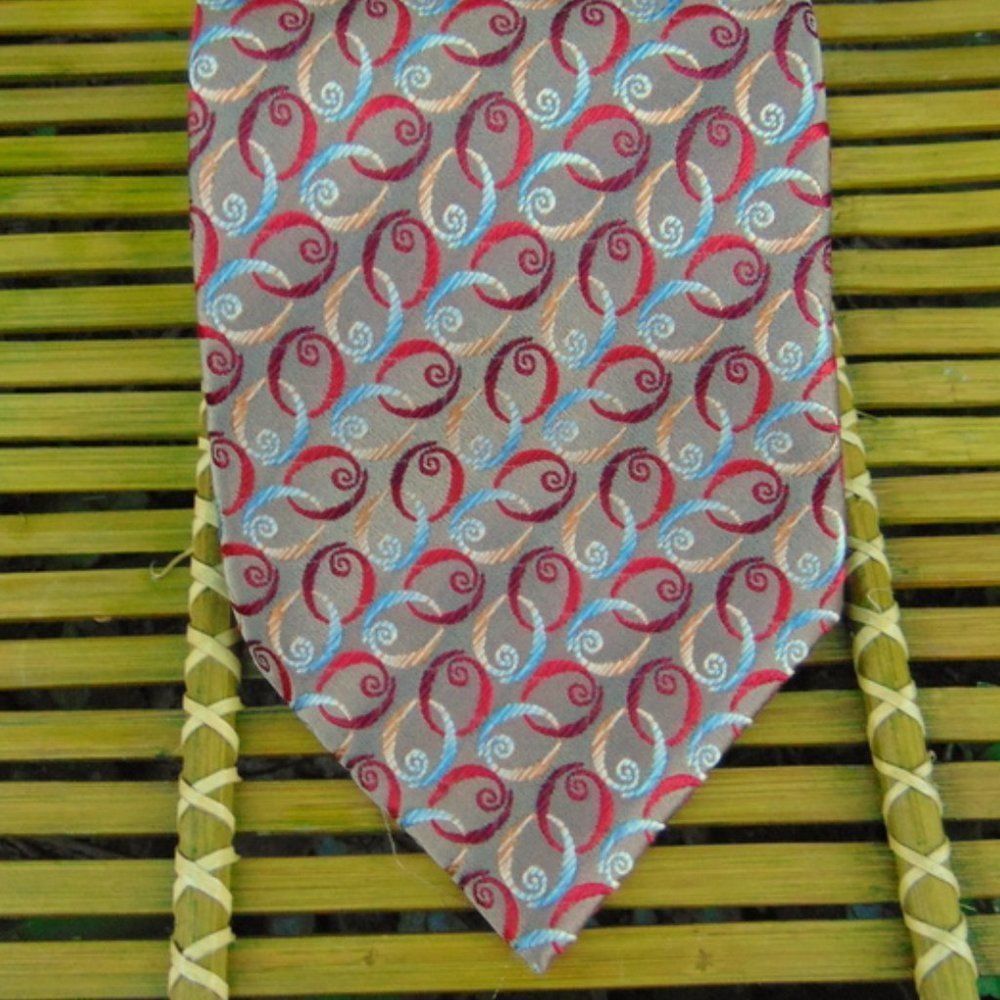 EUC JHANE BARNES Tan, Red & Blue Circular O Patterned 100% Silk Tie